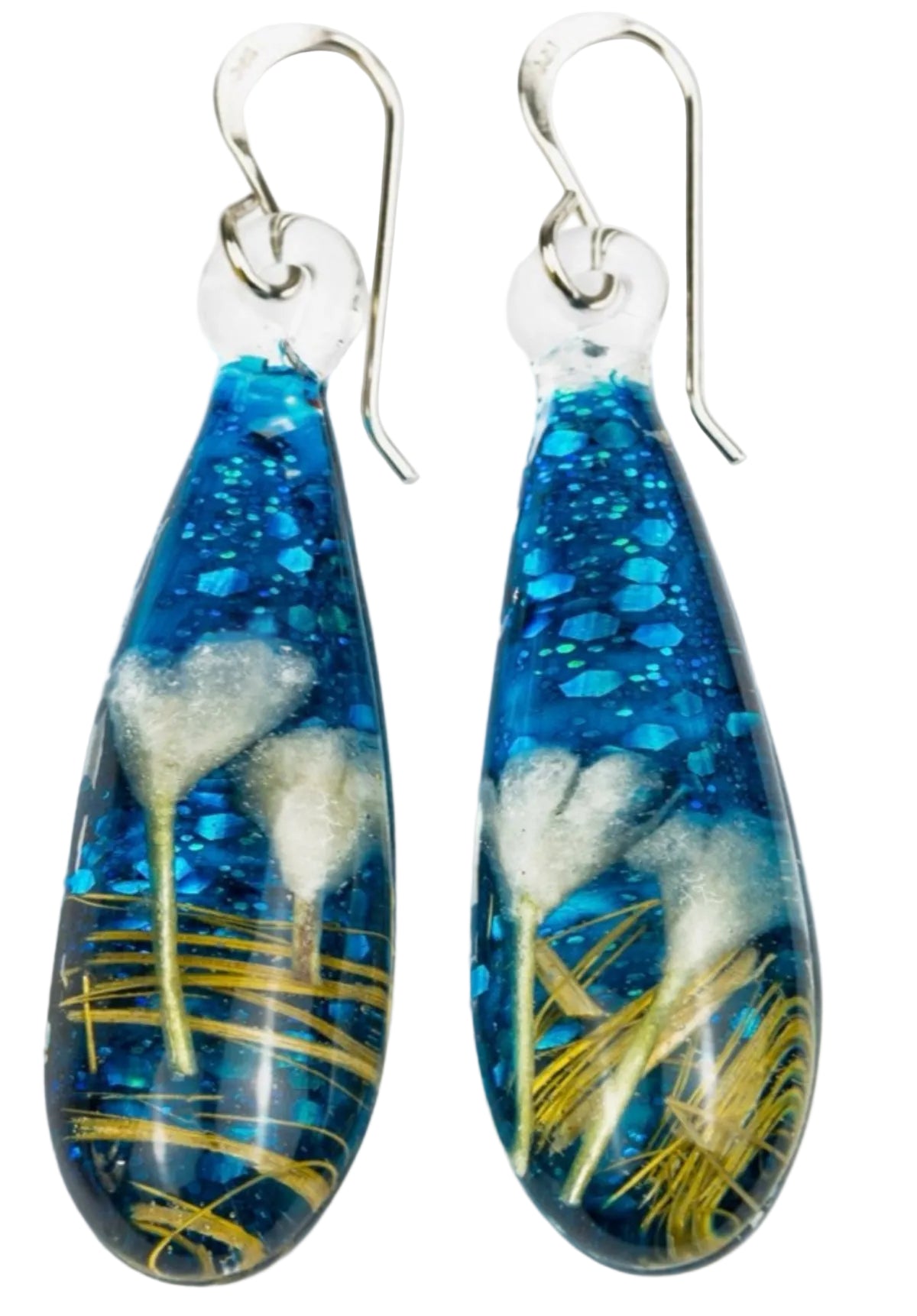 Handmade botanical dichroic glass drop earrings 2.1 inches long with real dried grass straws suspended in blue glass on sterling silver ear wires
